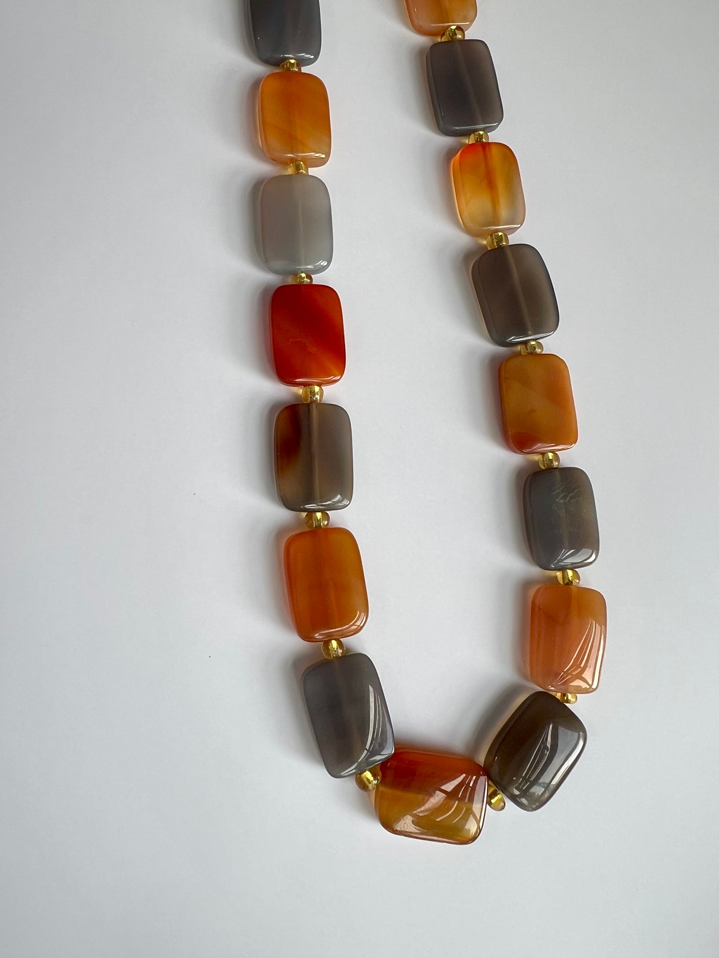 a necklace made of multicolored glass beads