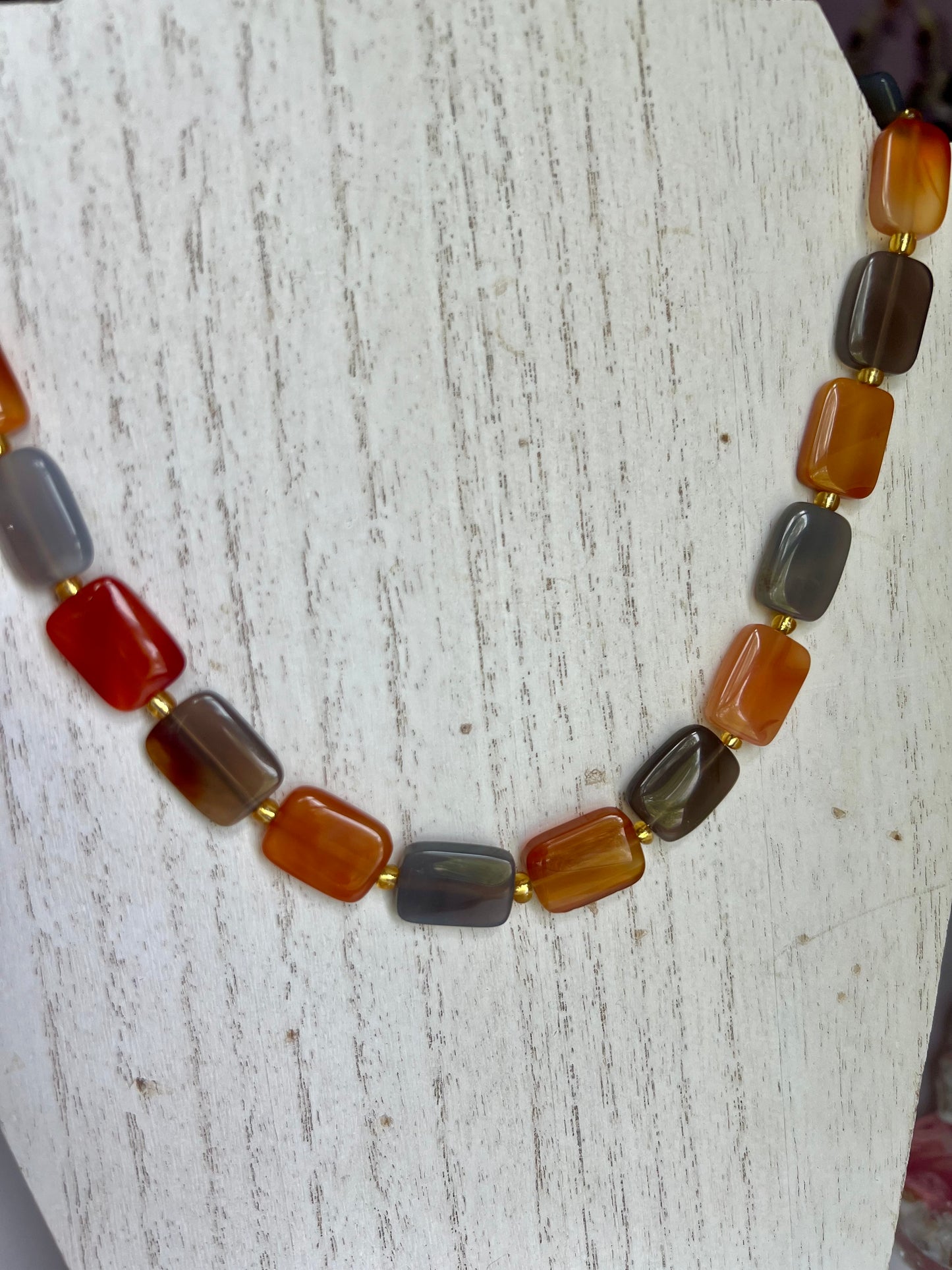 a necklace made of multicolored glass beads