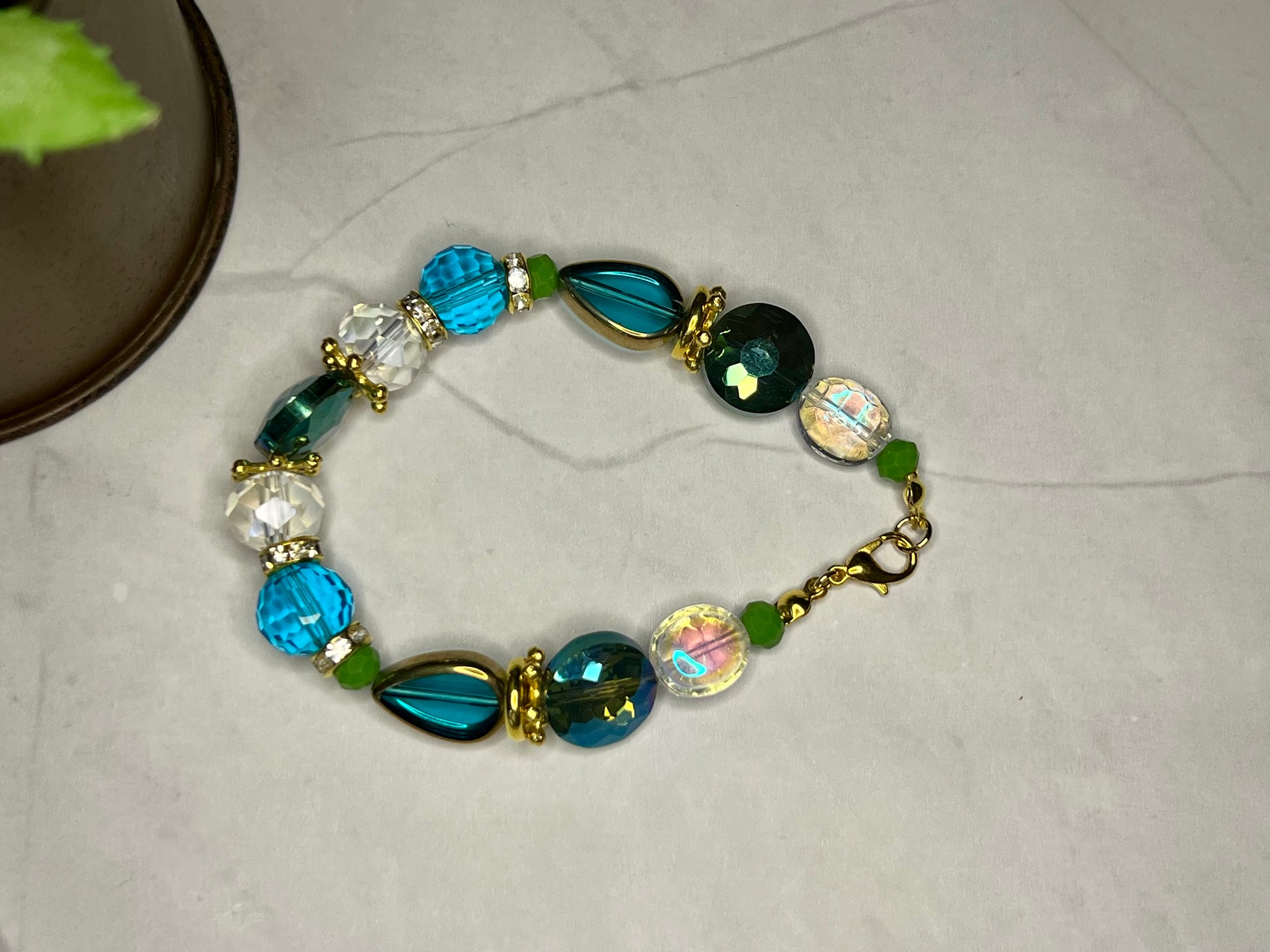 a close up of a bracelet on a table