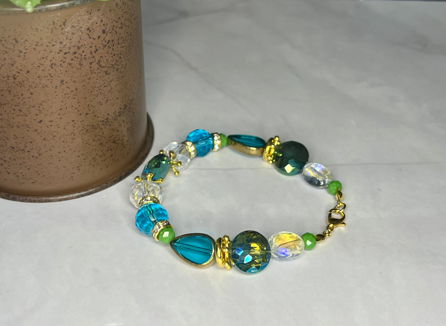 a close up of a bracelet on a table