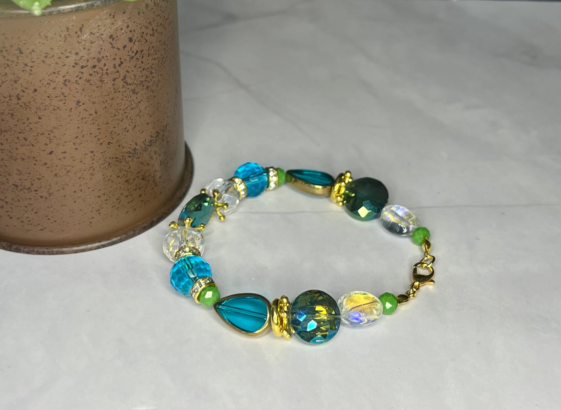 a close up of a bracelet on a table